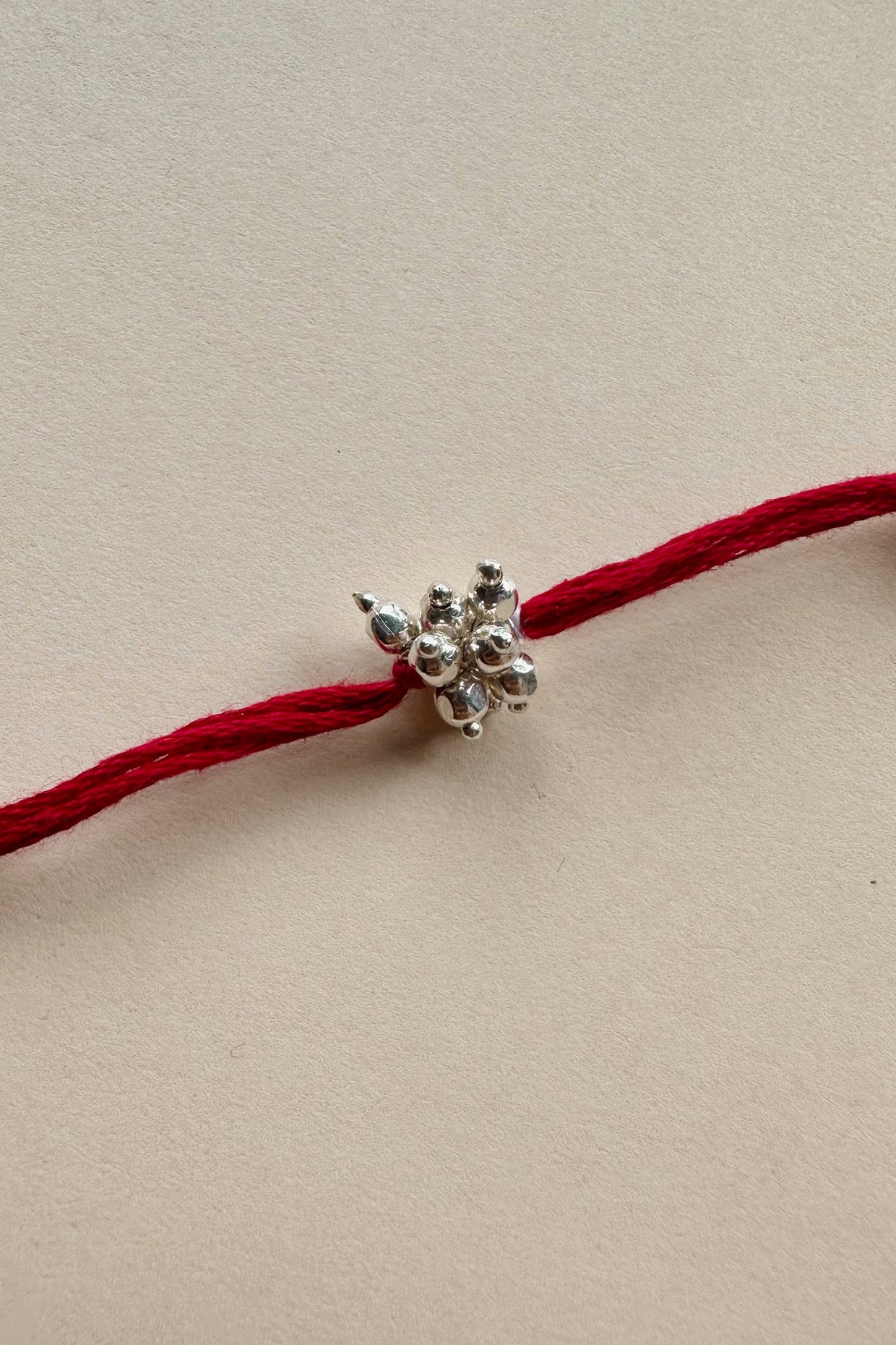 Handmade Pure Silver Rakhi with Fresh Water Pearls