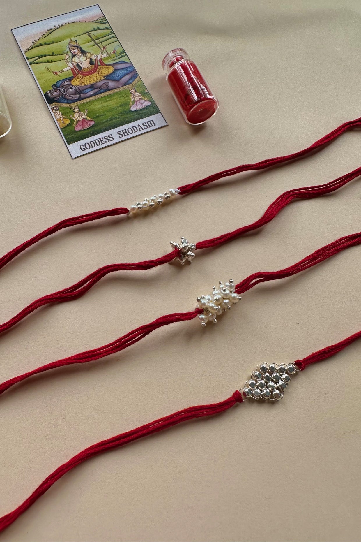 Handmade Pure Silver Rakhi with Fresh Water Pearls